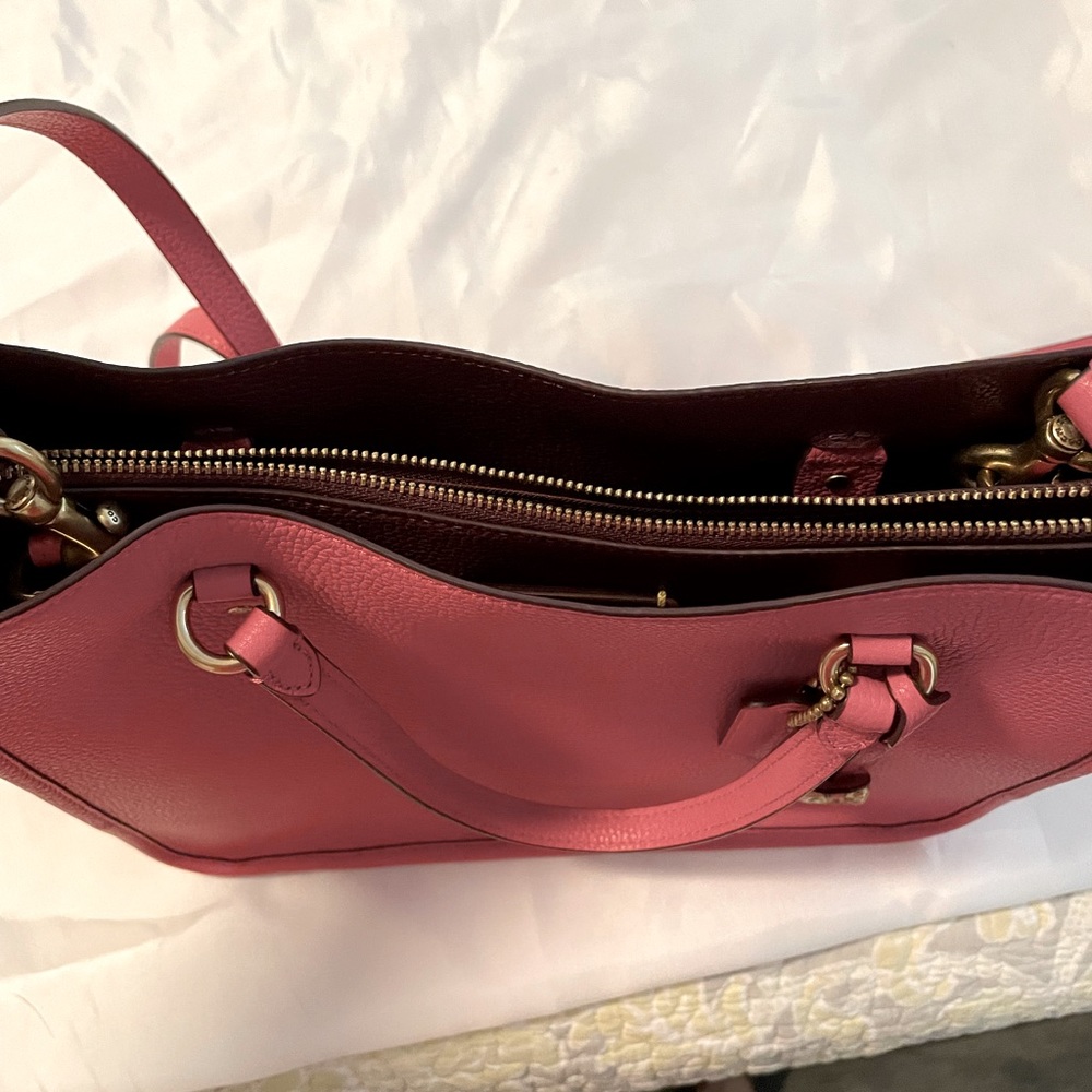 Coach Handbag. Dusty rose colored leather Excellent condition.